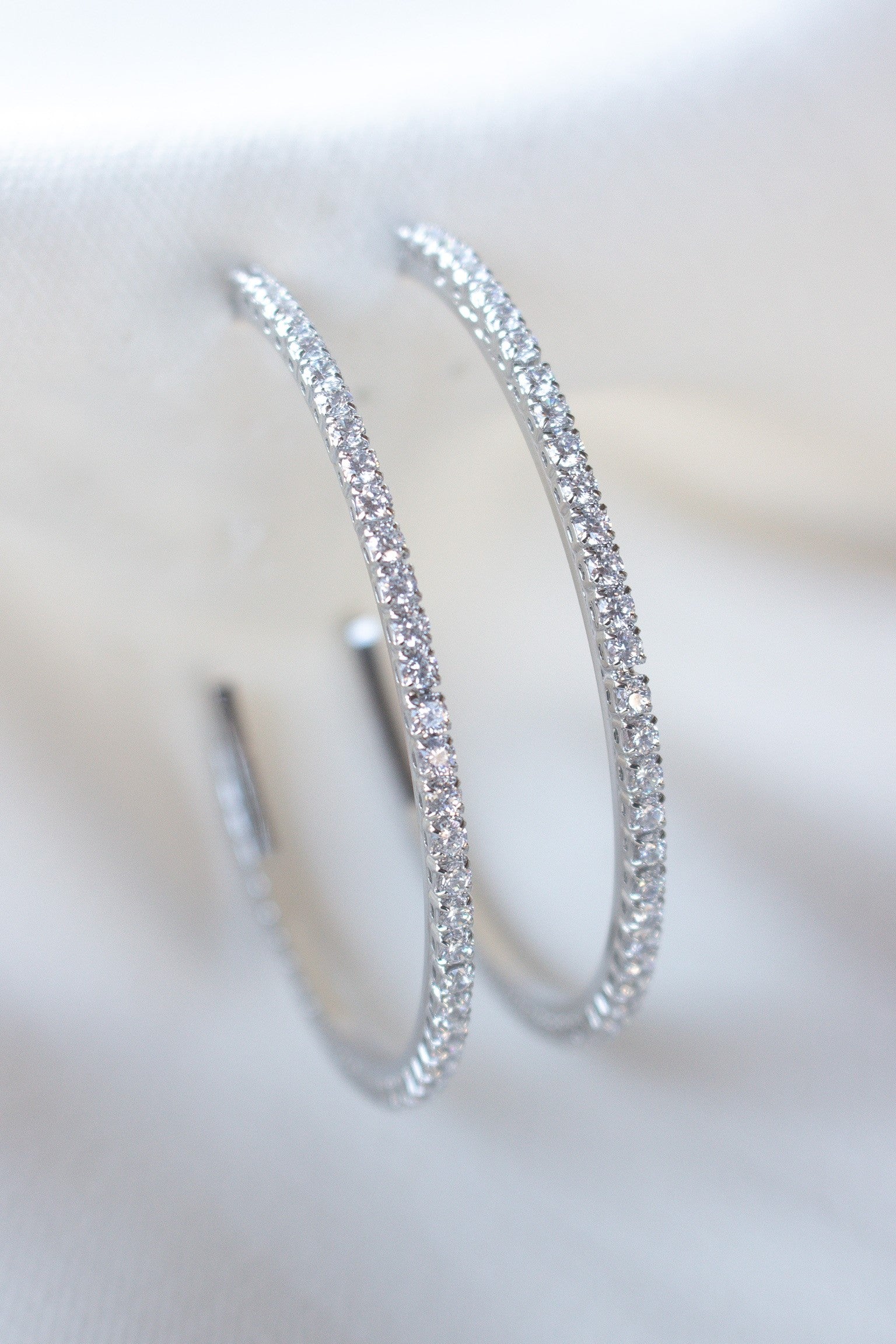 silver blaze hoops, Kinsey designs blaze hoops, blaze hoops with cz,  hoop earrings with cz diamonds front and sides,  silver hoop earrings with cz diamonds